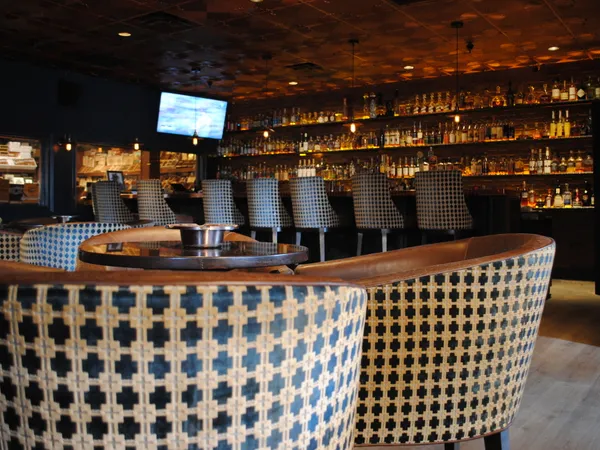 Churchill's cigar lounge — premium cigars and bourbon selection